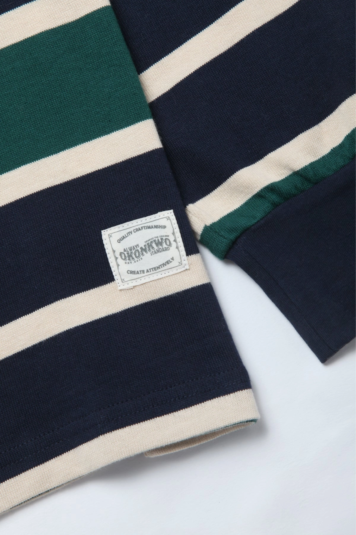 Sporty and Stylish Okonkwo MFG - Long Sleeve Striped Tee - Navy/Forest