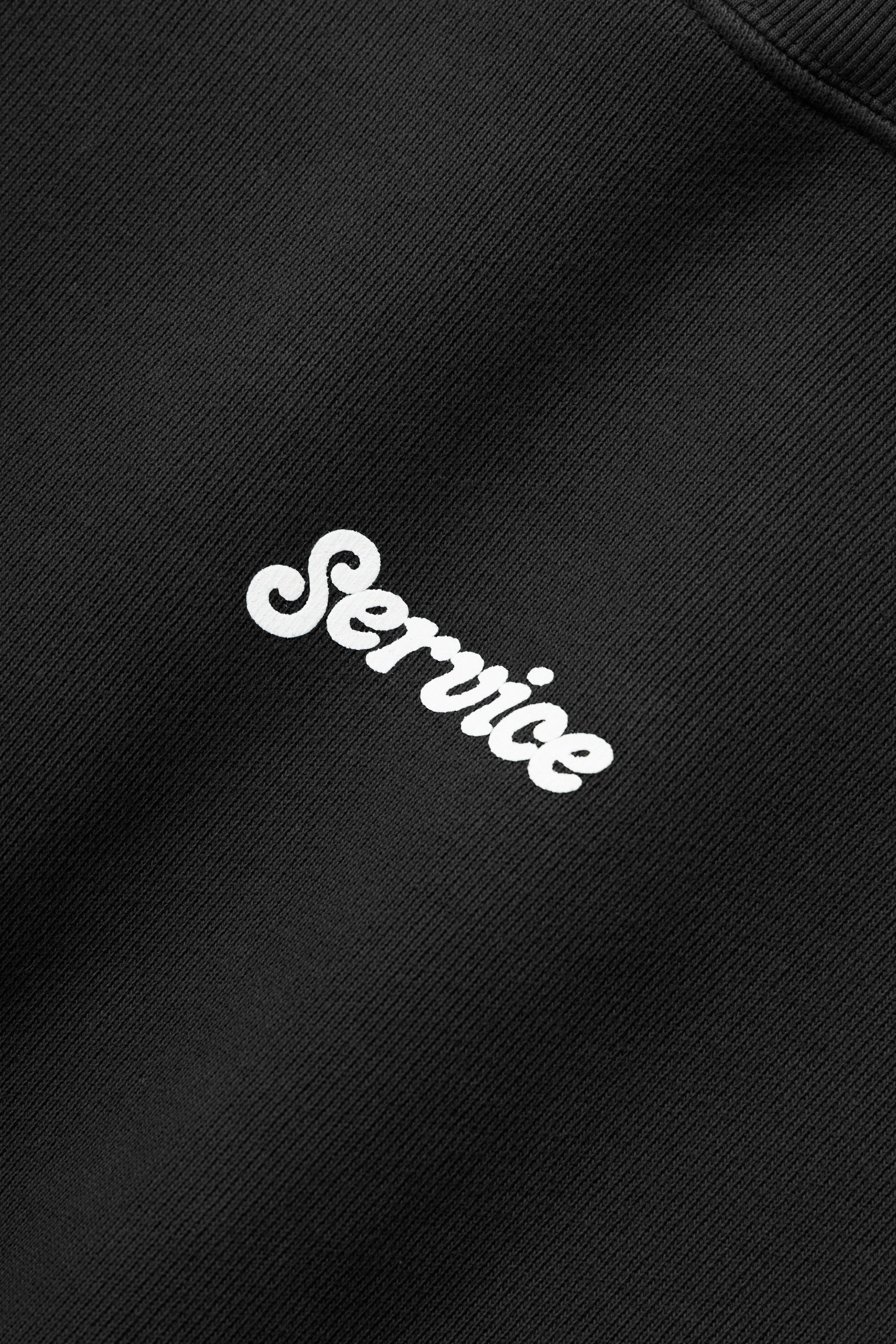 Service Works - Service Logo Crewneck - Black Cozy Wardrobe Side Slit Design