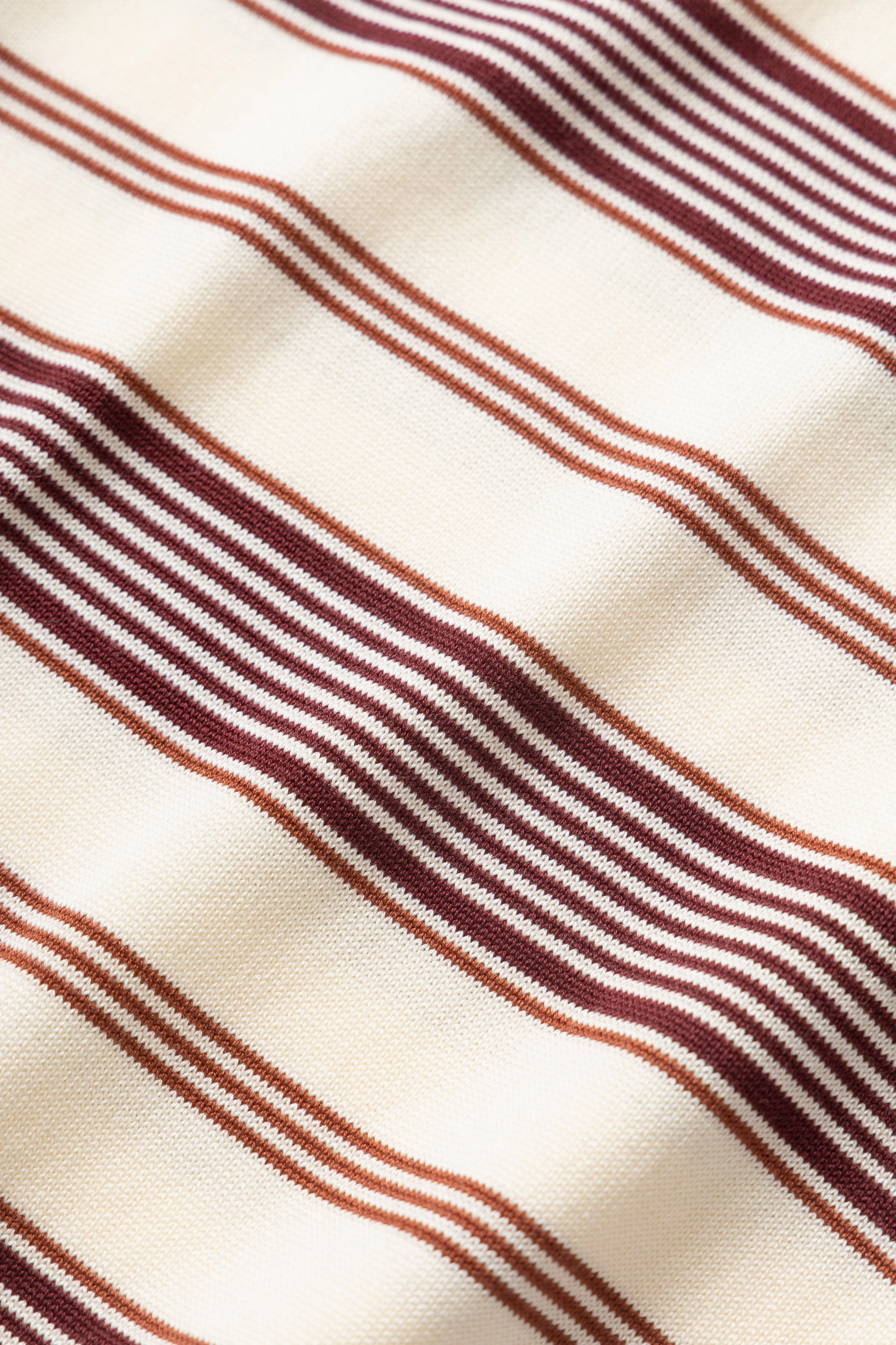 Okonkwo MFG - 50's Knitted Striped Shirt - Off White Foam Print Detail Printed Logo